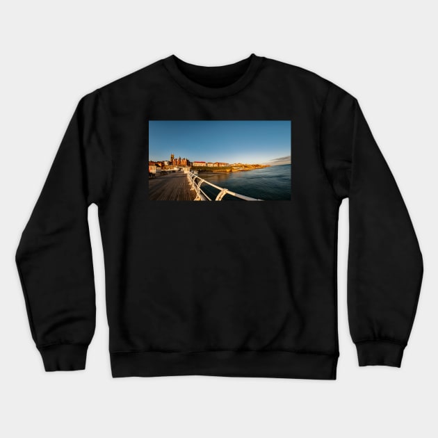 Fish eye view of Cromer at sunrise captured from the pier Crewneck Sweatshirt by yackers1